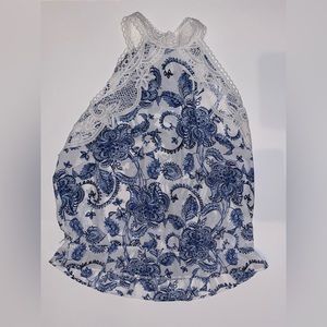 Sleeveless blue and white shirt